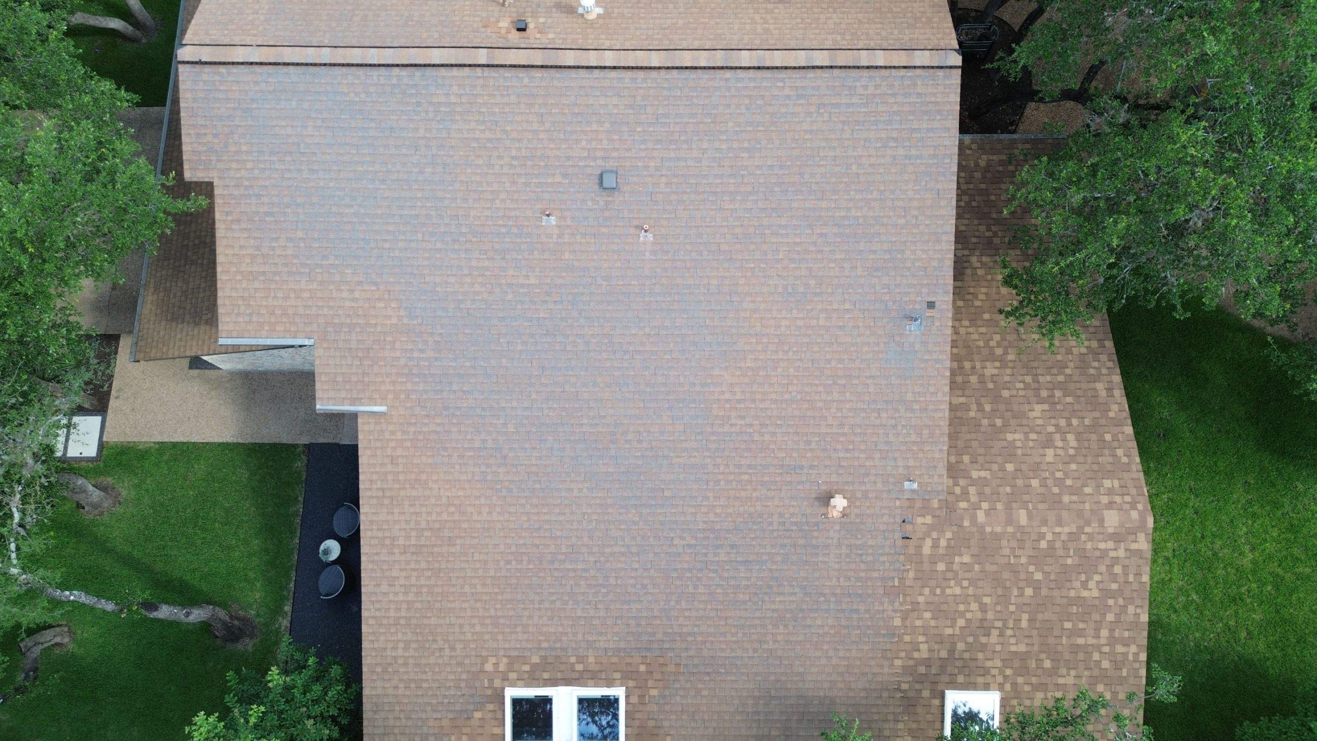 Original shingle roof before an Austin roof replacement