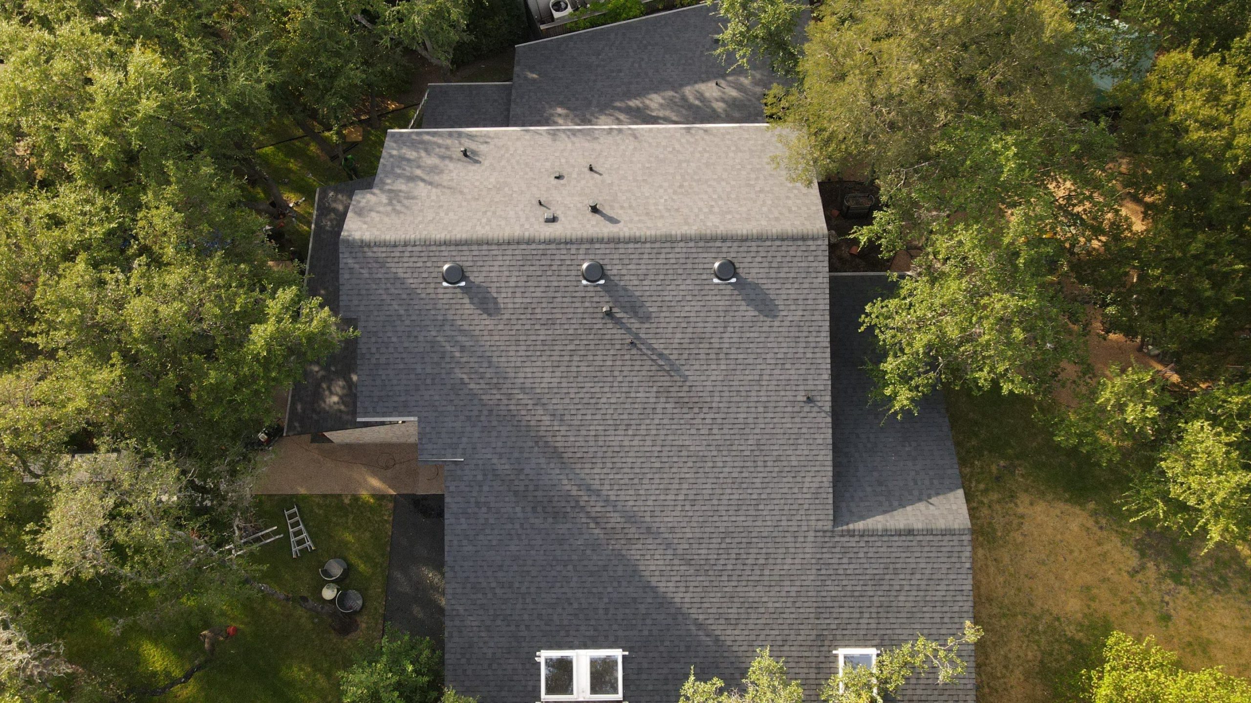 Completed shingle roof after an Austin roof replacement
