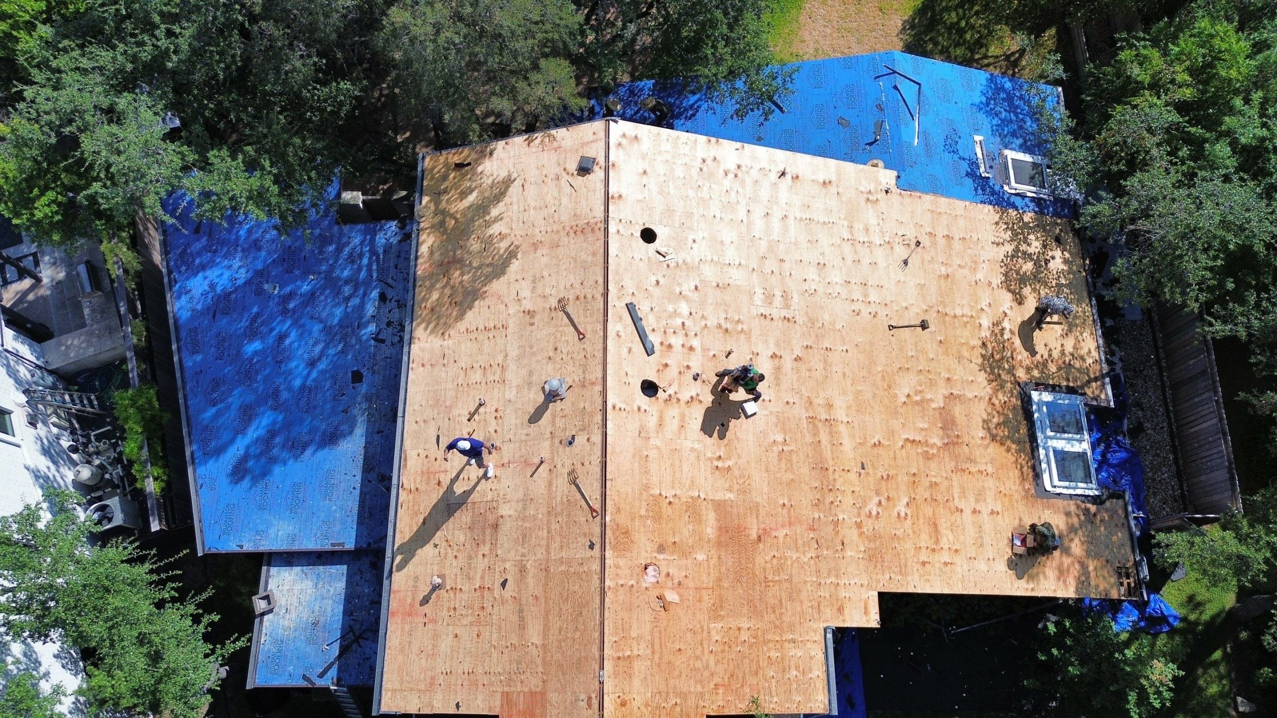 Exposed roof decking during an Austin roof replacement
